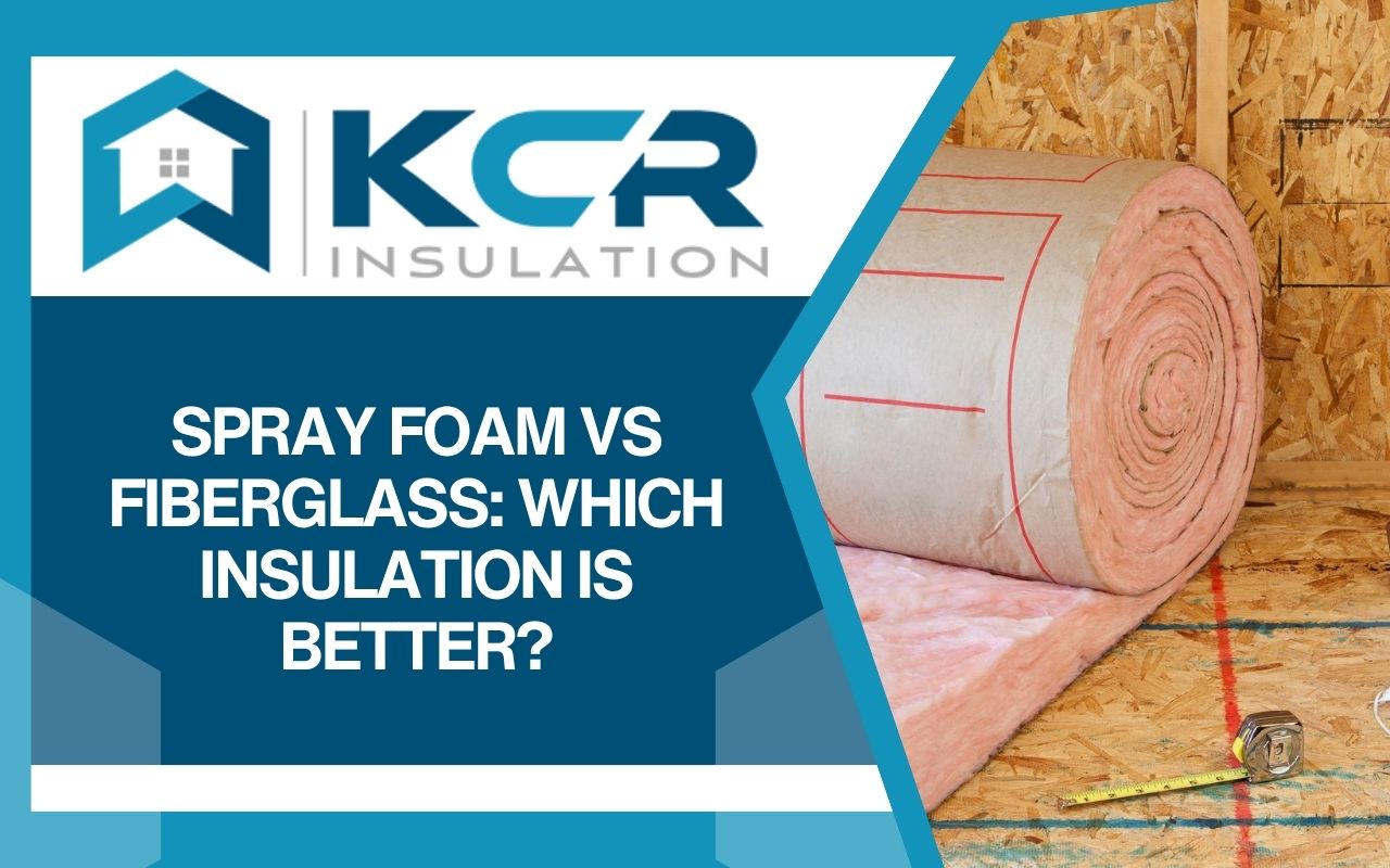 Contractor installing fiberglass insulation rolls